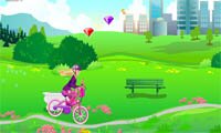 Играть в Барби на велосипеде
